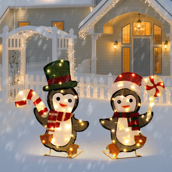 Set Of 2 Lighted Penguin And Candy Cane Christmas Decorations